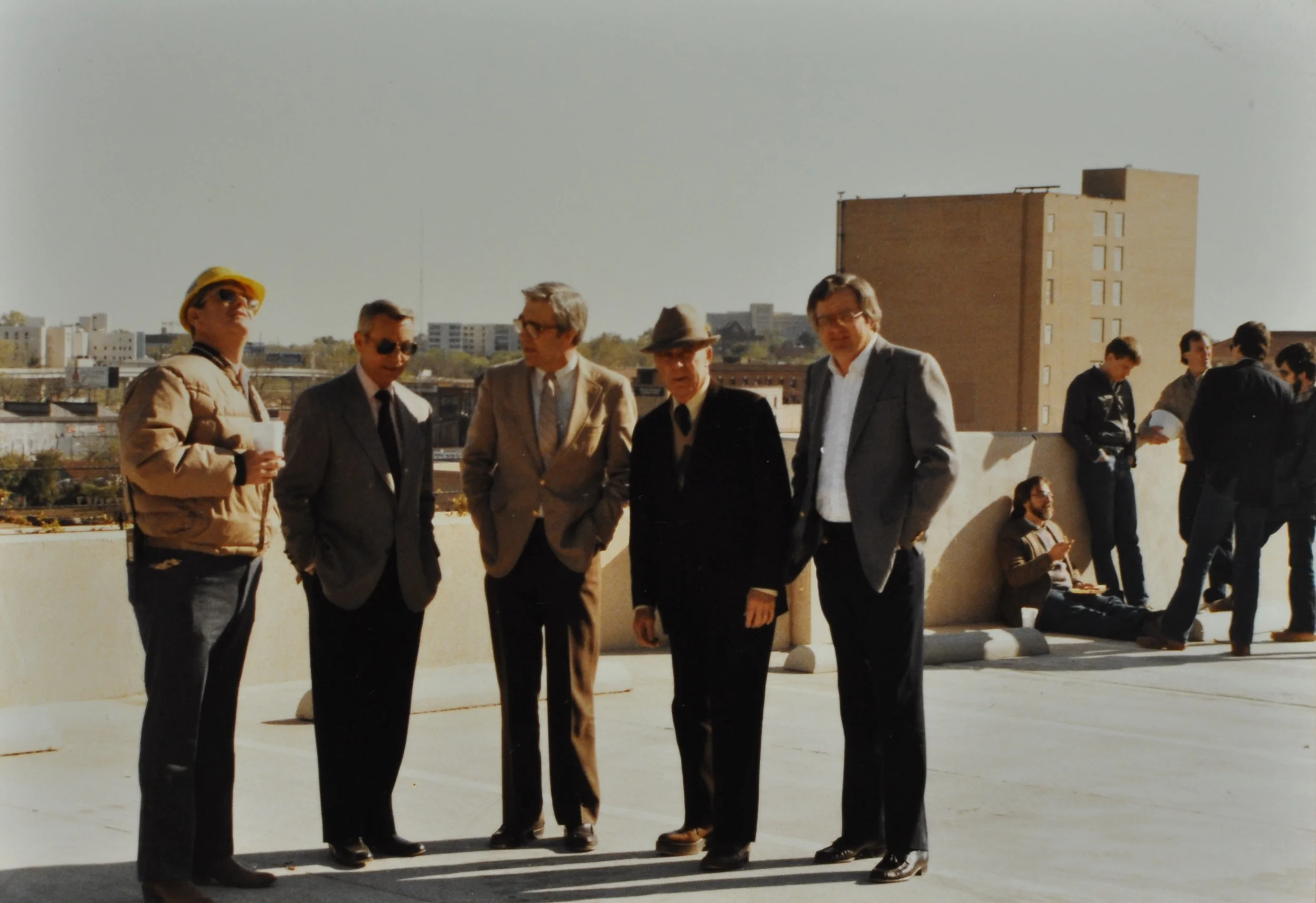 H.W.G. Golden, Grady and Bill Golden, J.W. Herring and a bank office are shown in this picture from 1988 atop the Commercial National Bank parking garage.