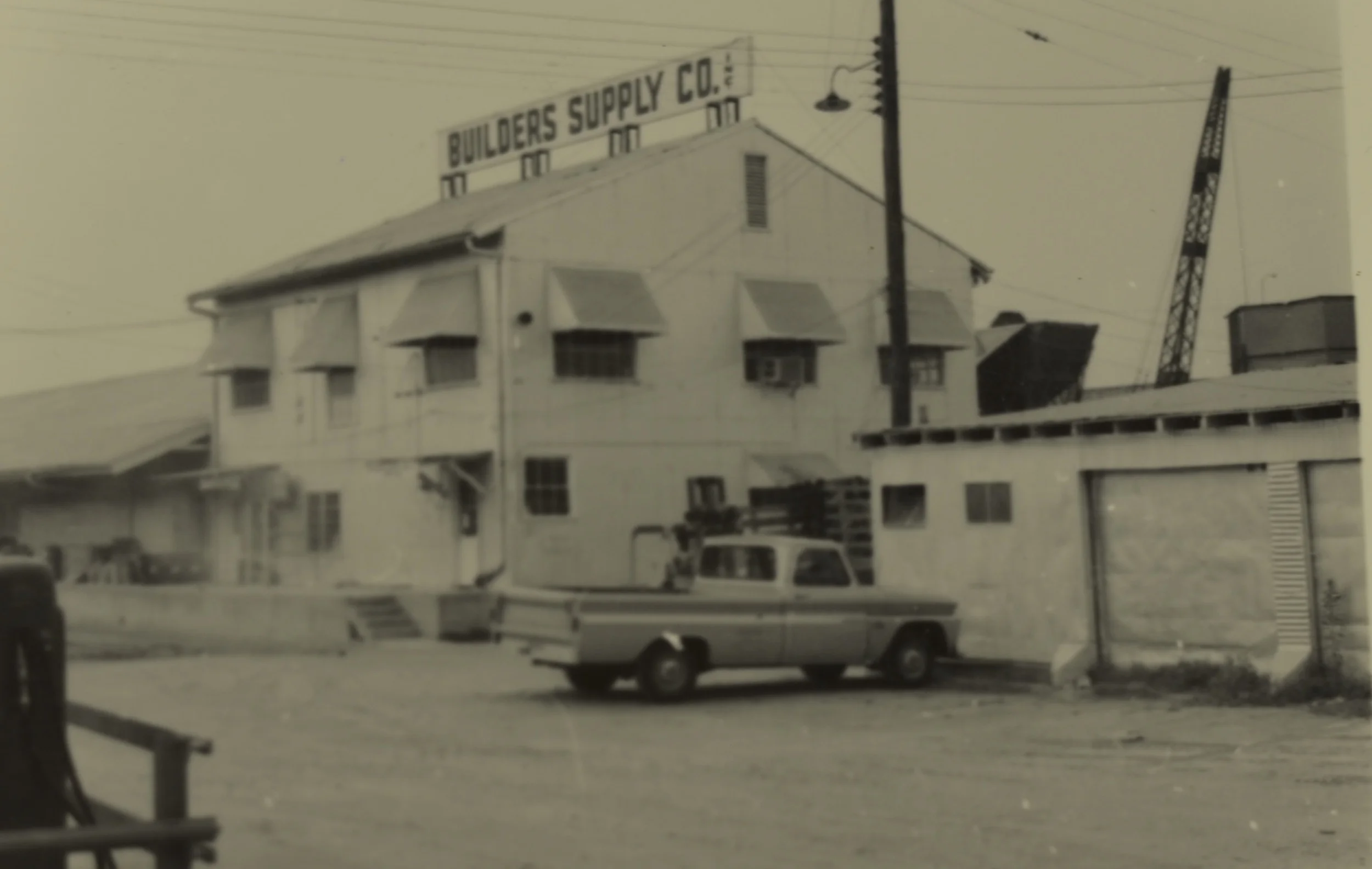 This picture shows the main office and warehouse as it looked in September 1966. Notice the sign on top of the warehouse. This sign could be seen from the nearby freeways. 