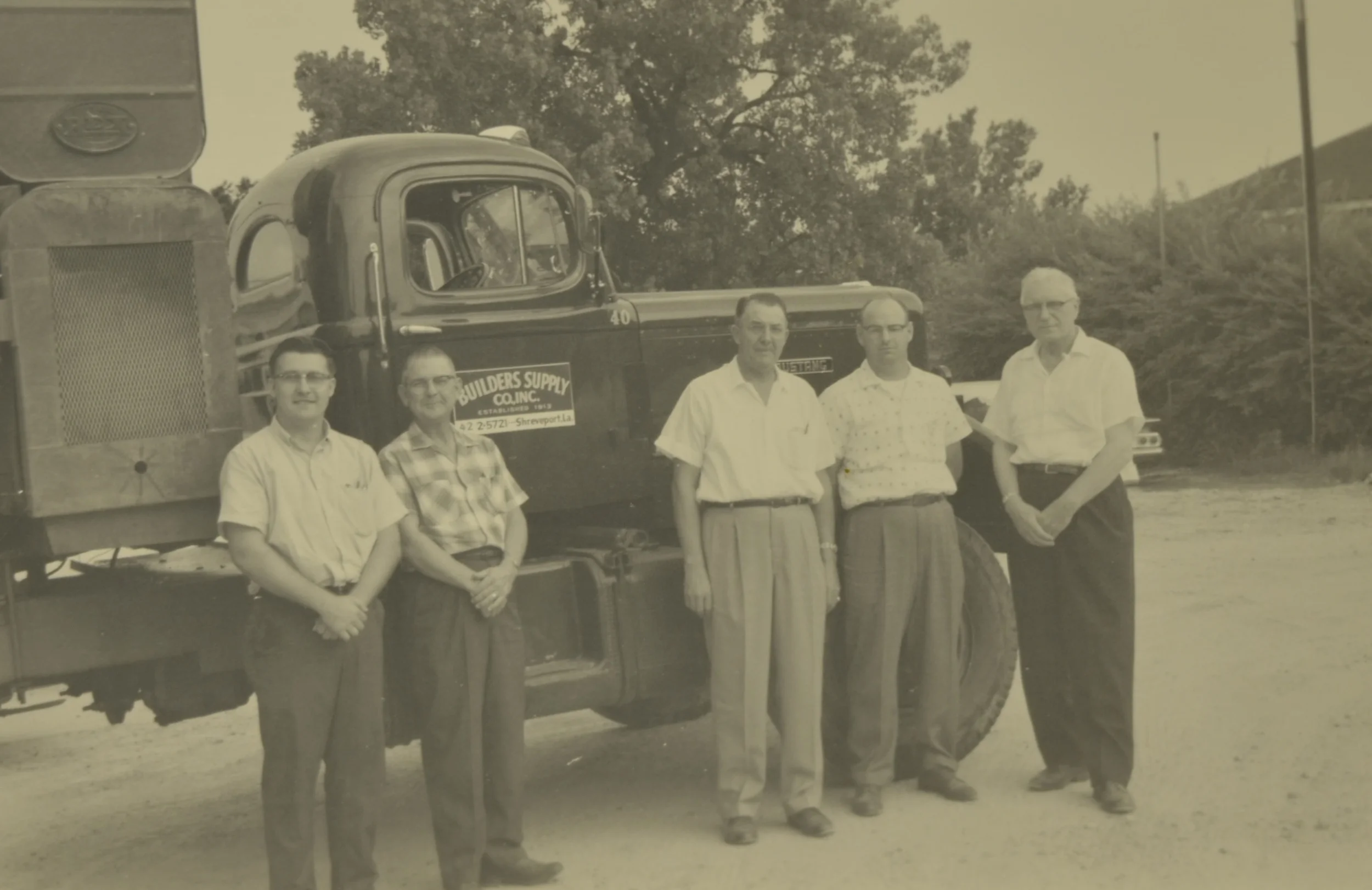 The sales staff pictured here in July 1961 include: Grady C. Golden, Charles Olson, N.R. Ward, J.W. Herring and J. Drew Moreland as Sales Manager.